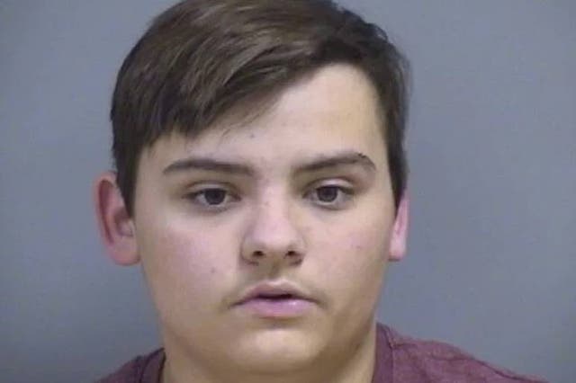 <p>An armed teenager was arrested after posting a chilling selfie holding a rifle in which he threatened ‘Lewiston part 2.’ Michael Bowden, 18, is accused of taking the picture holding the weapon and ammunition outside a Walmart in the state and posting it on Snapchat.</p>