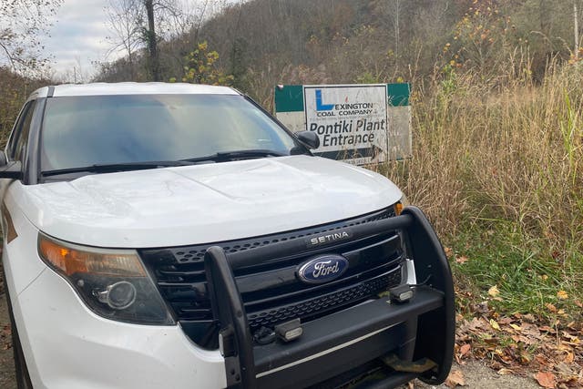 <p>In this image provided by WCHS-TV, a Martin County, Ky., sheriff's cruiser is shown outside an abandoned mine coal preparation plant Wednesday, Nov. 1, 2023, south of Inez, Ky</p>