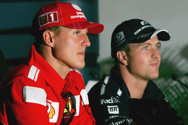 <p>Michael Schumacher (left) with brother Ralf in 2004 </p>