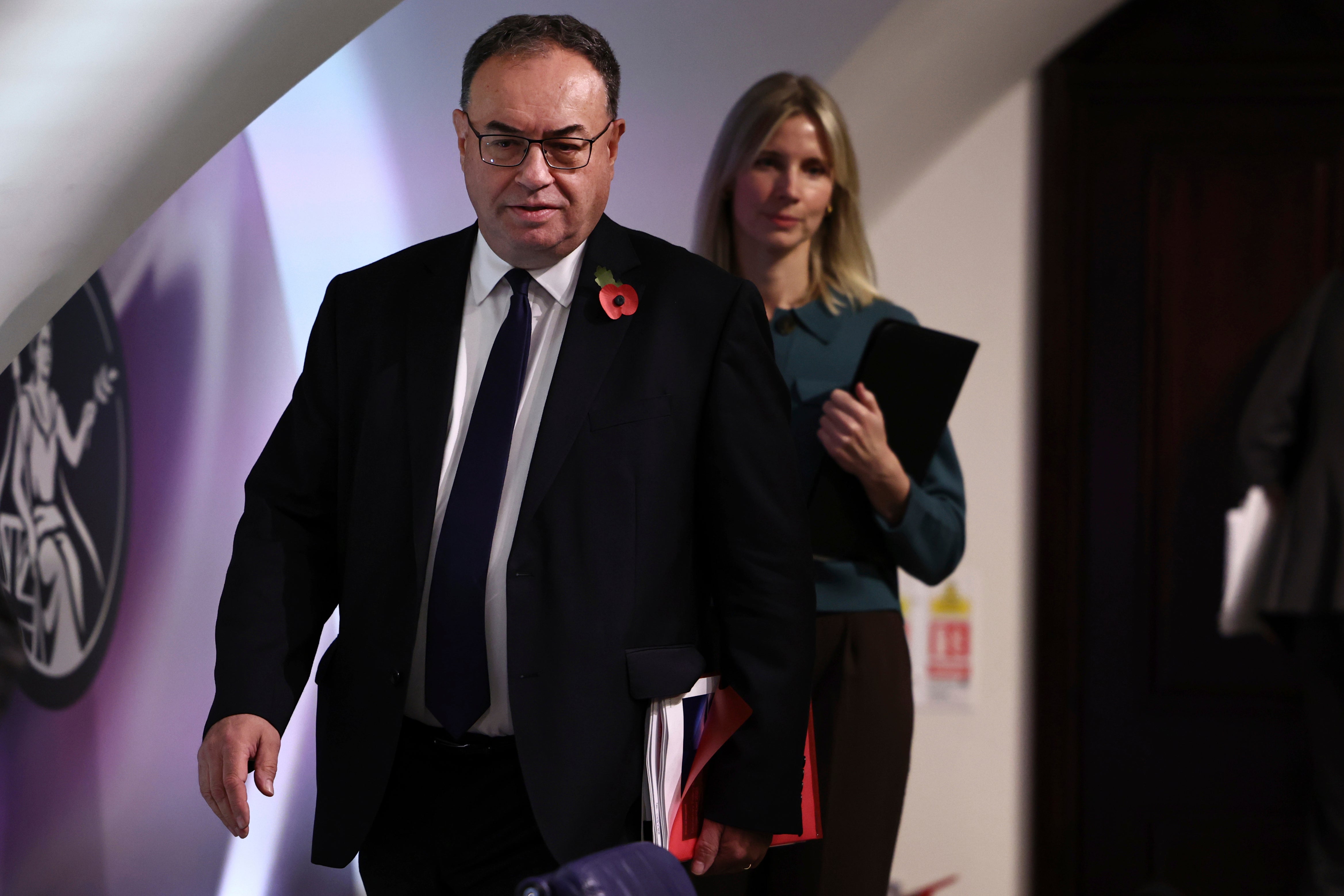 Governor of the Bank of England Andrew Bailey arrives to address the media during a press conference on Thursday