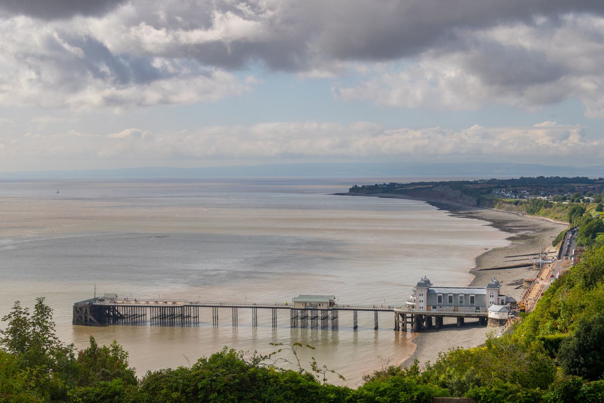 Body of woman found on Welsh beach after being spotted by walkers