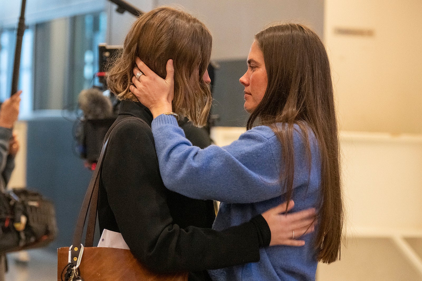 Caitlin Cash, who found Wilson’s body, is embraced during the first day of trial for State of Texas v. Kaitlin Armstrong