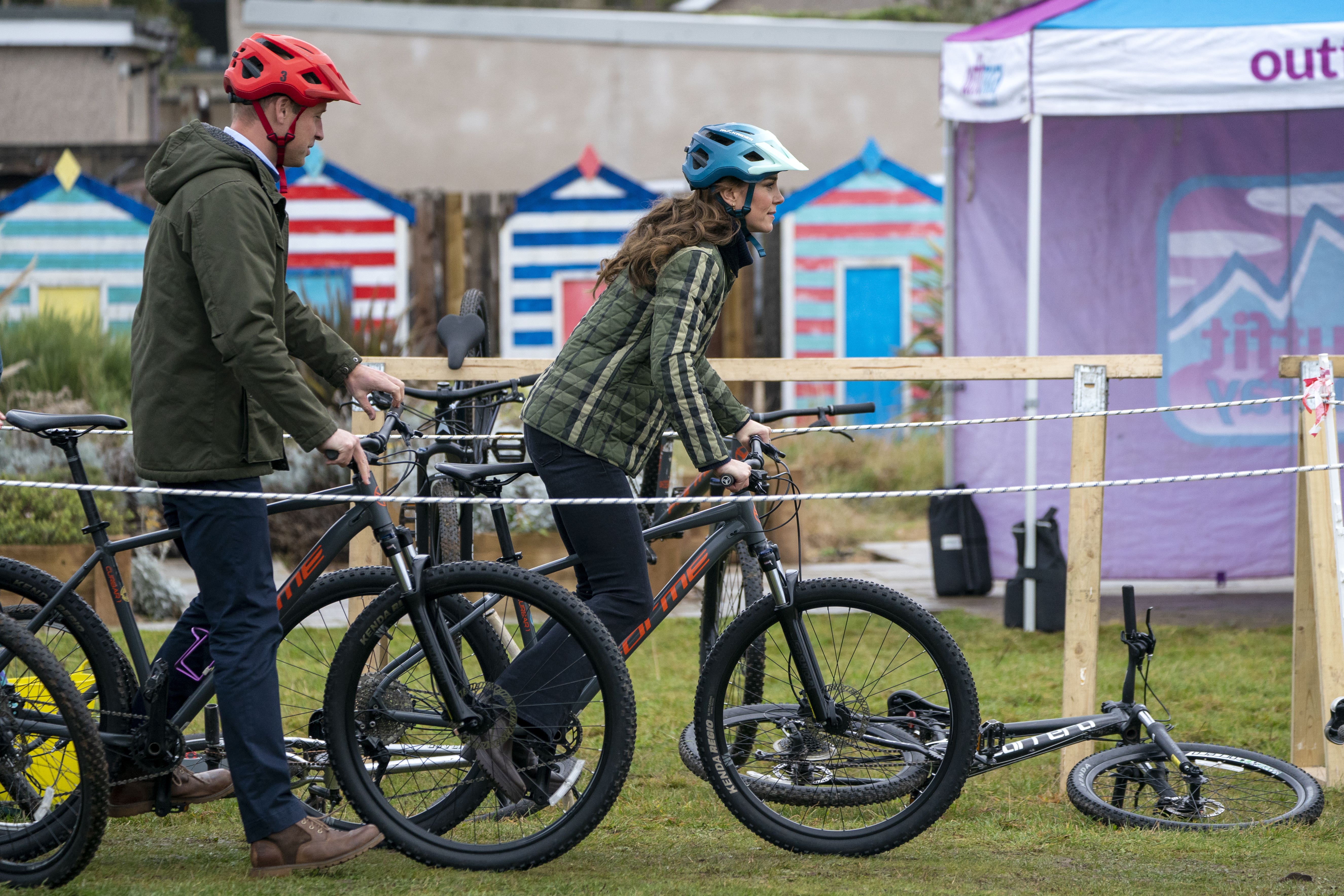 The Prince and Princess of Wales navigated an obstacle course on mountain bike (Jane Barlow/PA
