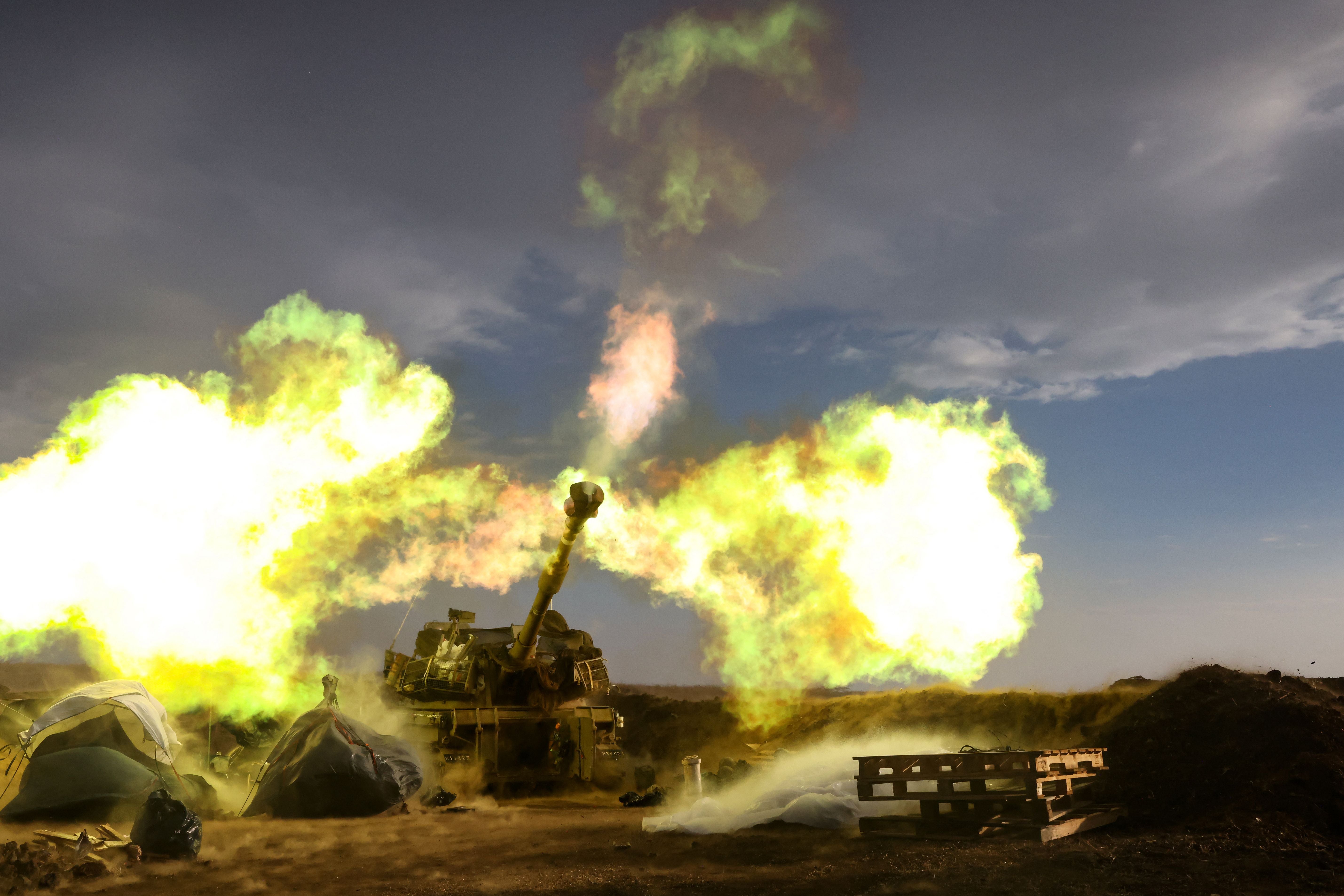 An Israeli artillery unit fires during a military drill in the annexed Golan Heights near the border with Lebanon on November 2