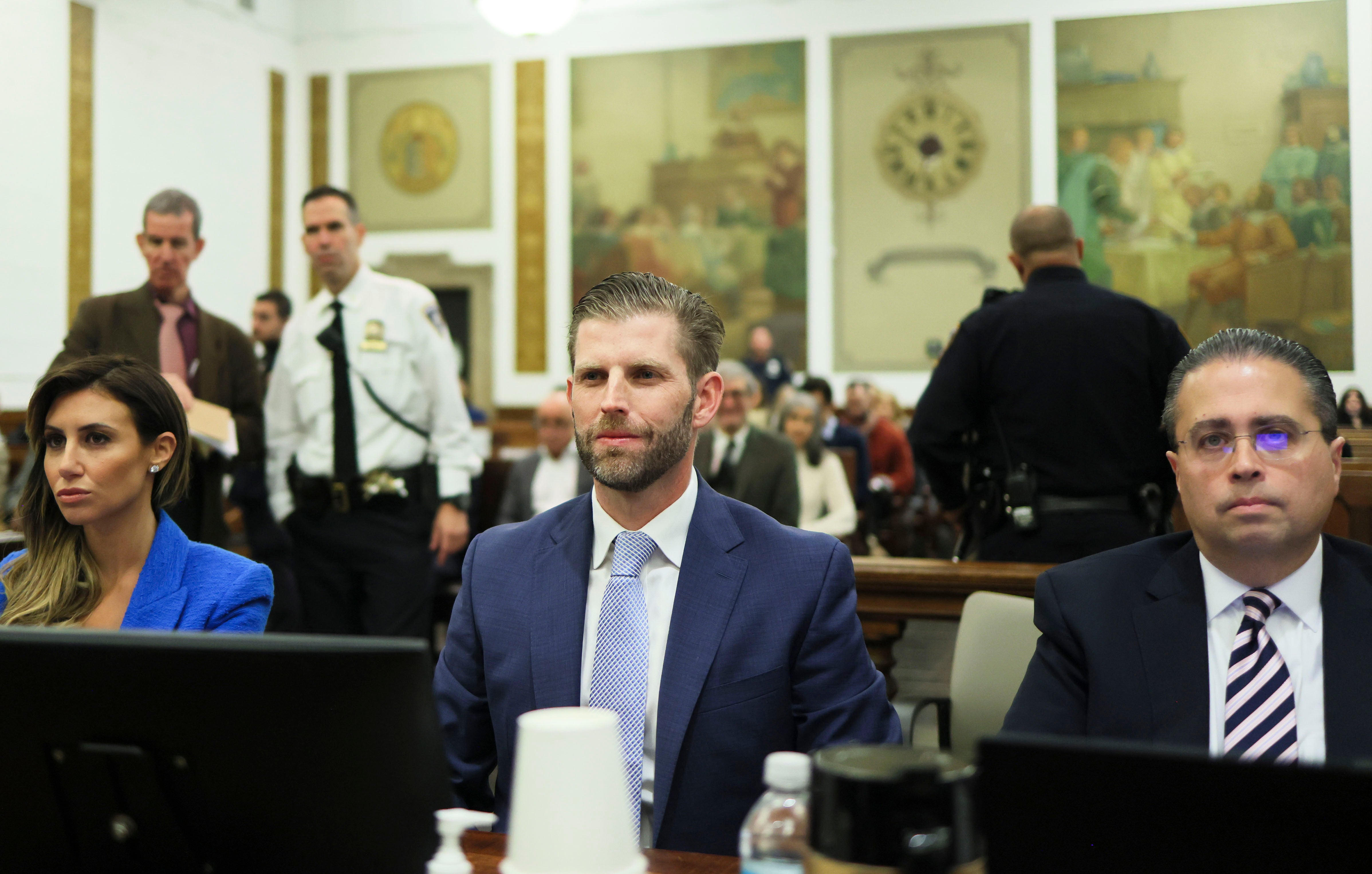 Eric Trump is pictured between his attorneys at the defence table moments before his testimony in a civil trial for fraud in New York Supreme Court