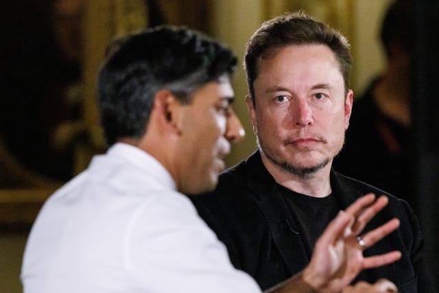<p>Elon Musk listens to Rishi Sunak at the UK-hosted artificial intelligence safety summit this week </p>
