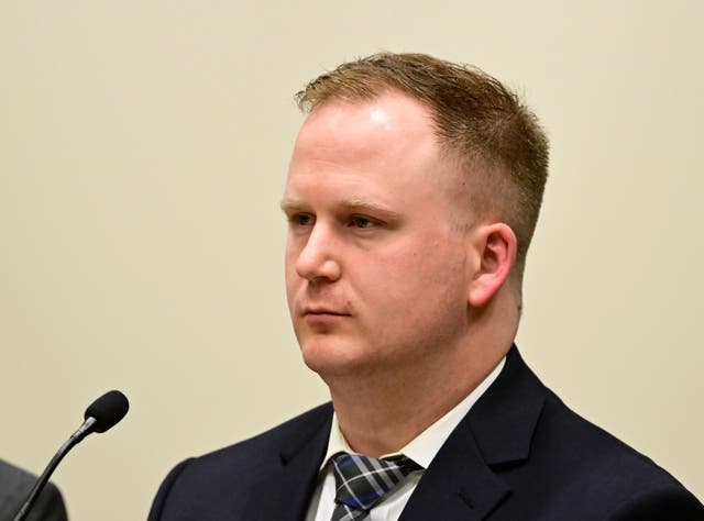 <p>FILE - Aurora, Colorado police officer Nathan Woodyard attends an arraignment hearing after being charged in the 2019 death of Elijah McClain, 20 January 2023</p>