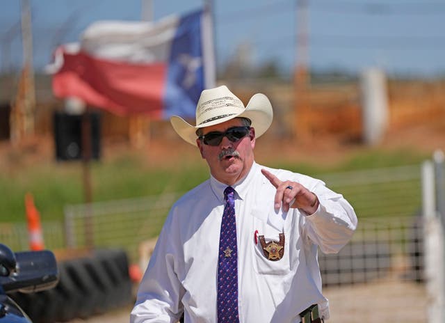 <p>San Jacinto County Sheriff Greg Capers answers a question after a news conference</p>