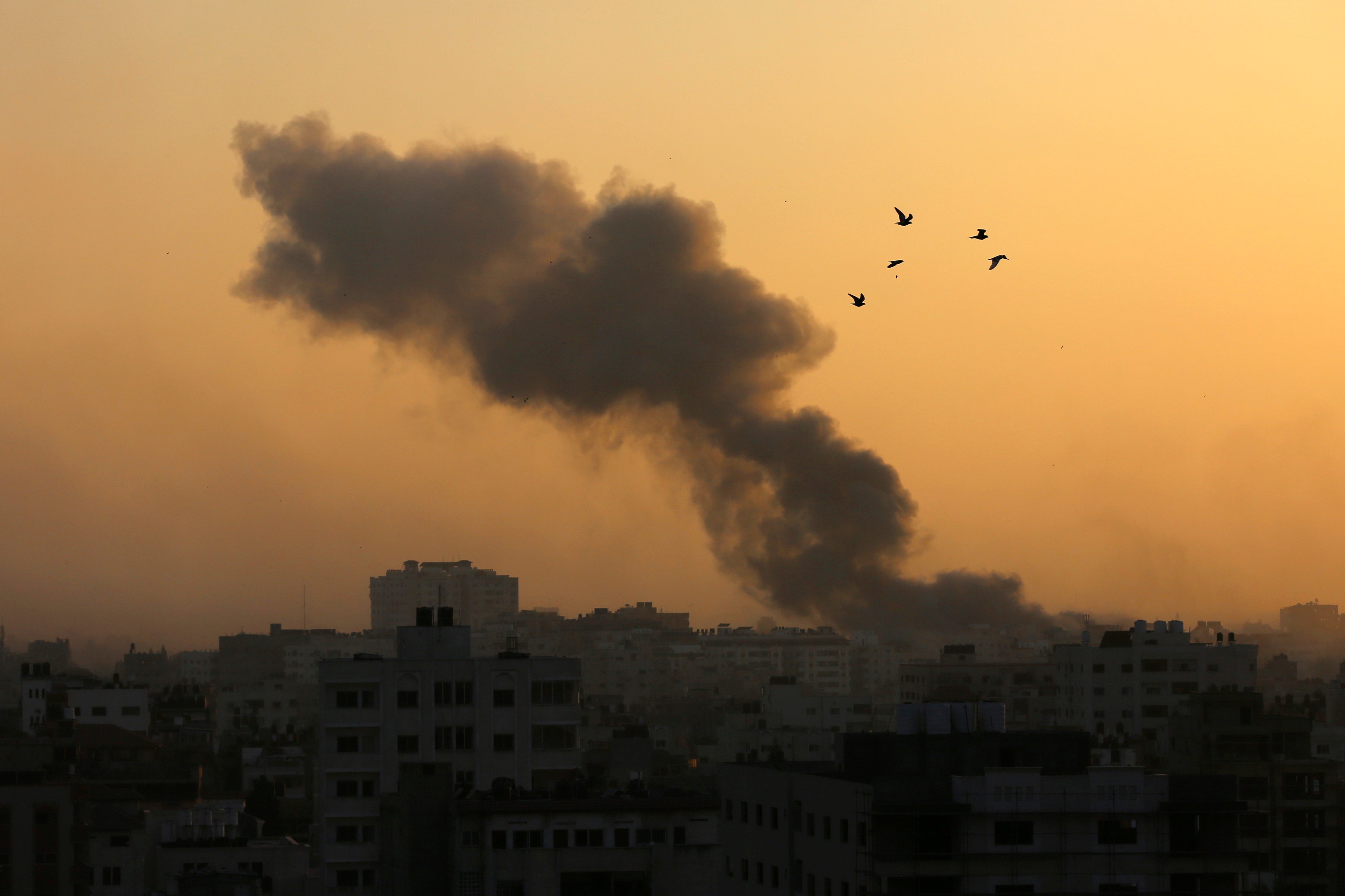 Smoke rises following Israeli airstrikes in Gaza City