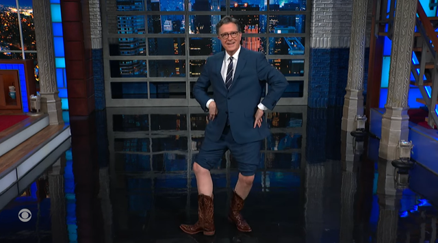 <p>Stephen Colbert shows off his inspired DeSantis boots </p>