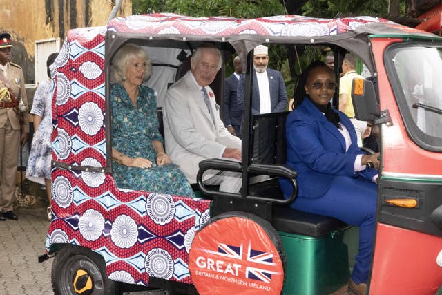 Charles and Camilla arrived by tuk-tuk at Fort Jesus in Mombasa (Ian Vogler/Daily Mirror/PA)
