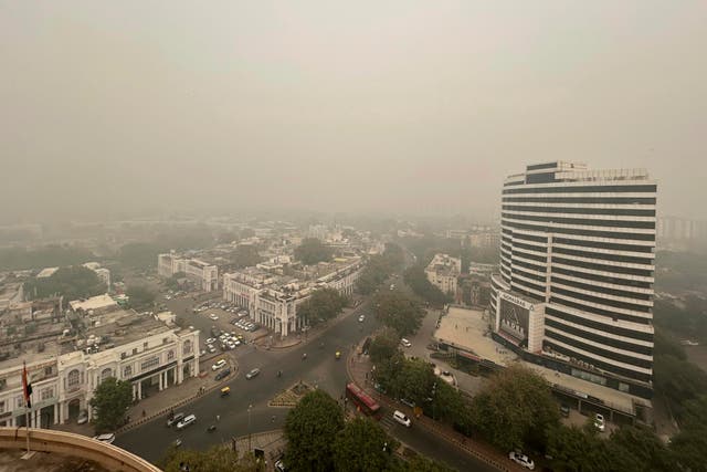 <p>Smog hangs over the city skyline in New Delhi, India</p>