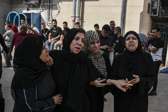 <p>Palestinian relatives  outside Jenin Hospital before a funeral of a man killed in the city </p>