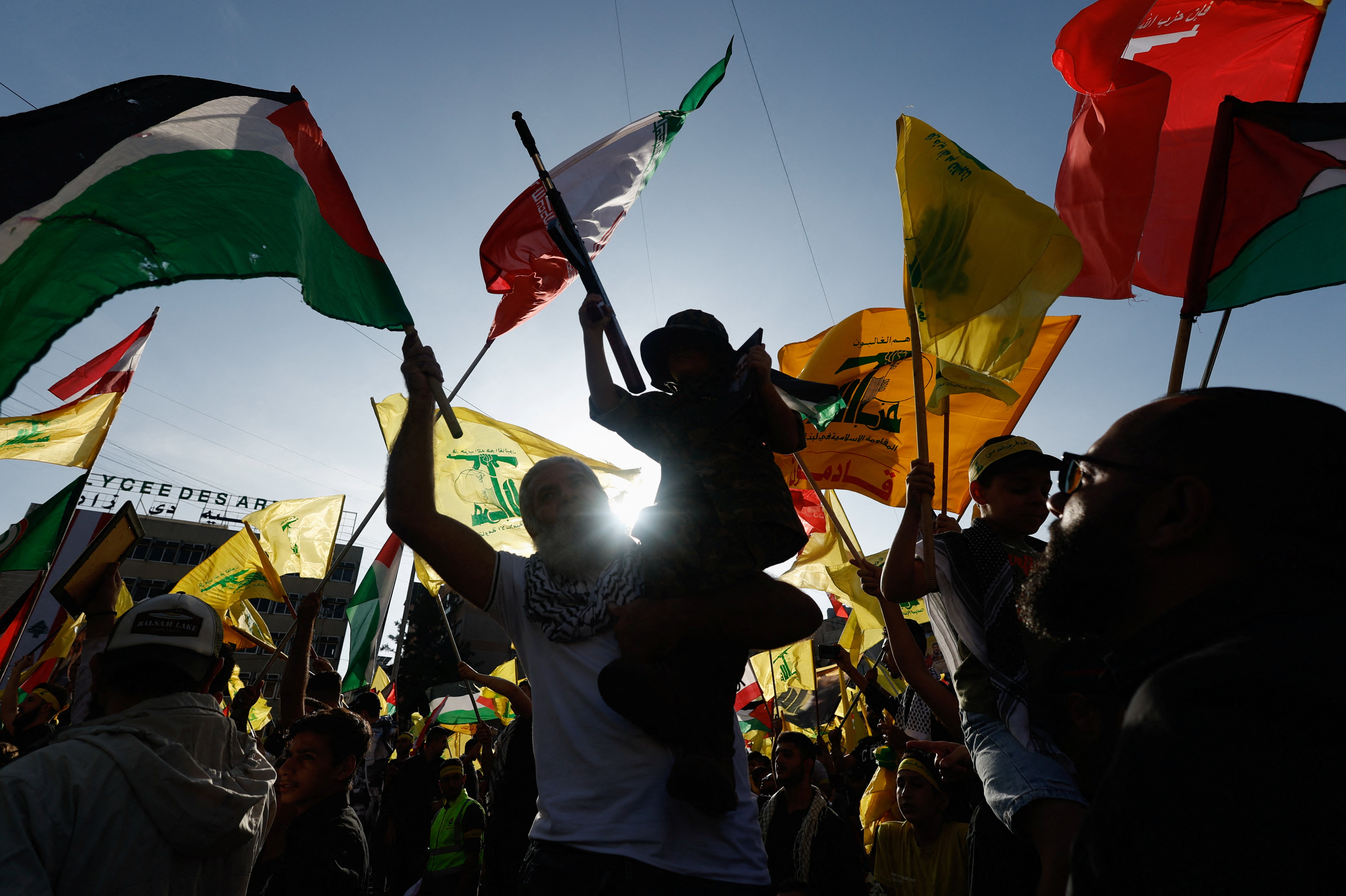 Supporters of Lebanon’s Hezbollah leader Sayyed Hassan Nasrallah gather to watch his address in Beirut