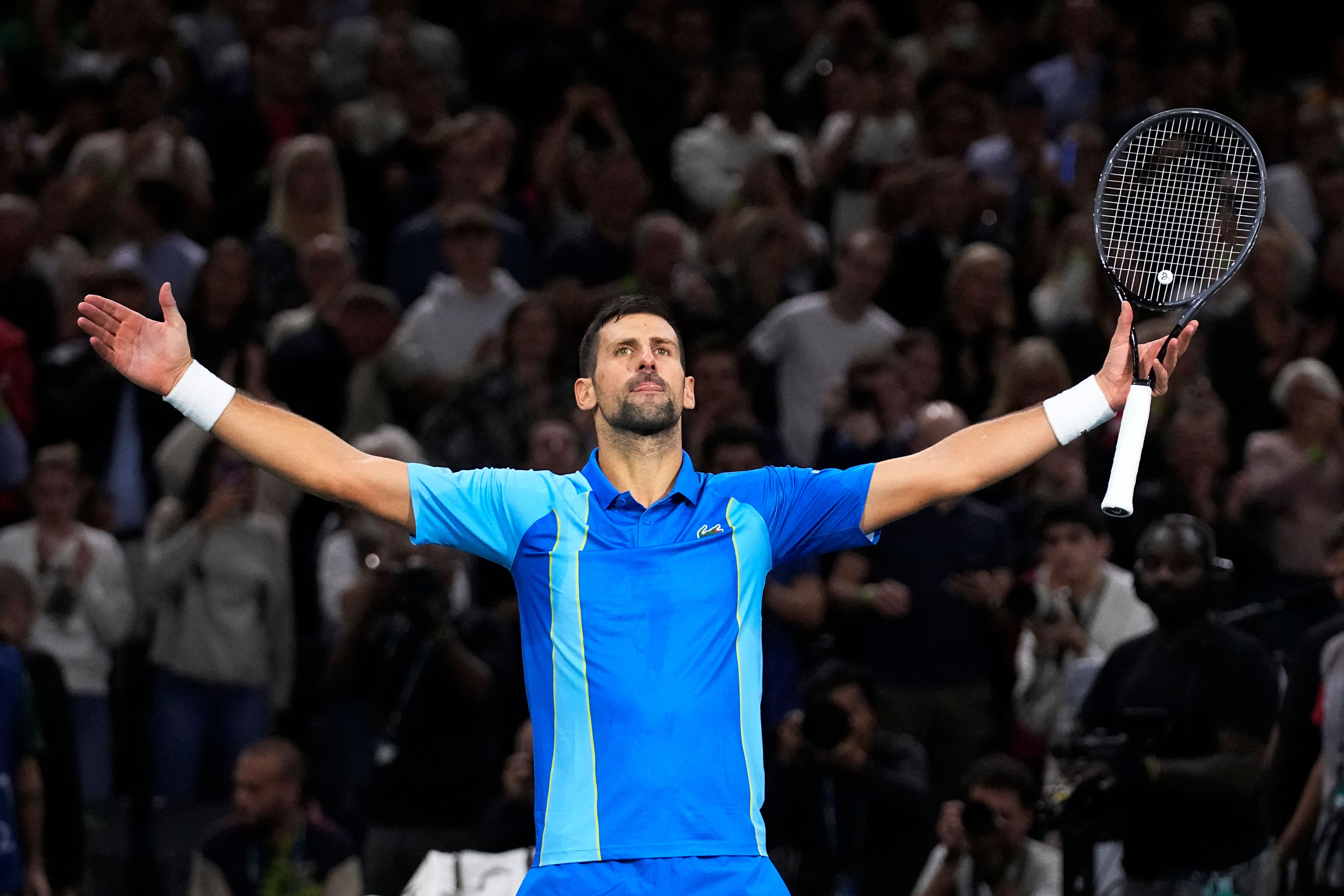 Novak Djokovic overcomes booing crowd to beat Holger Rune at Paris Masters | The Independent