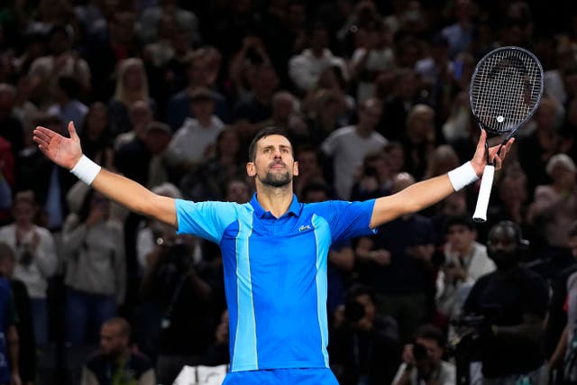 Novak Djokovic celebrates beating Holger Rune at the Paris Masters (AP Photo/Michel Euler/PA)