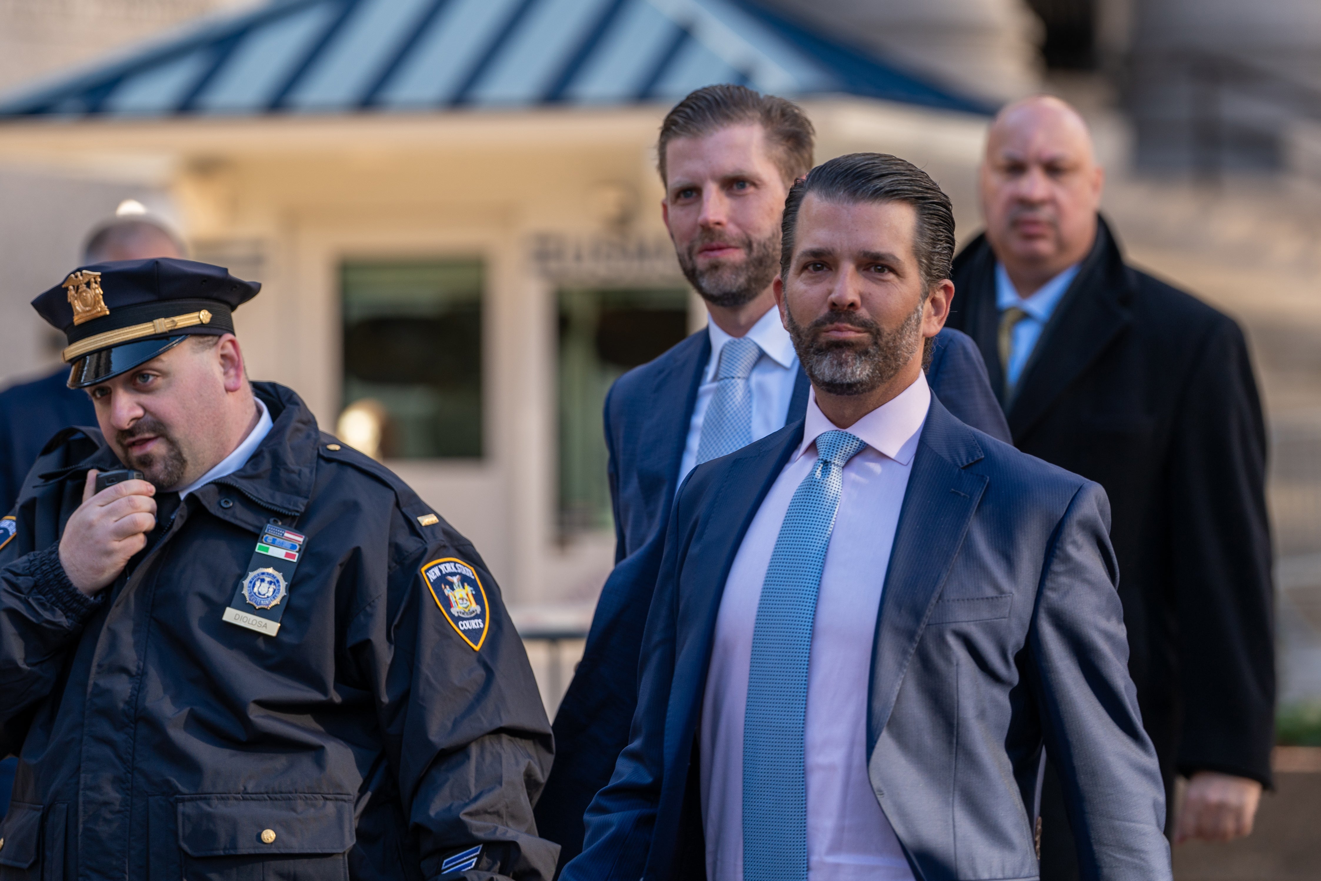 Eric Trump and Donald Trump Jr arrive at New York Supreme Court on 2 November.