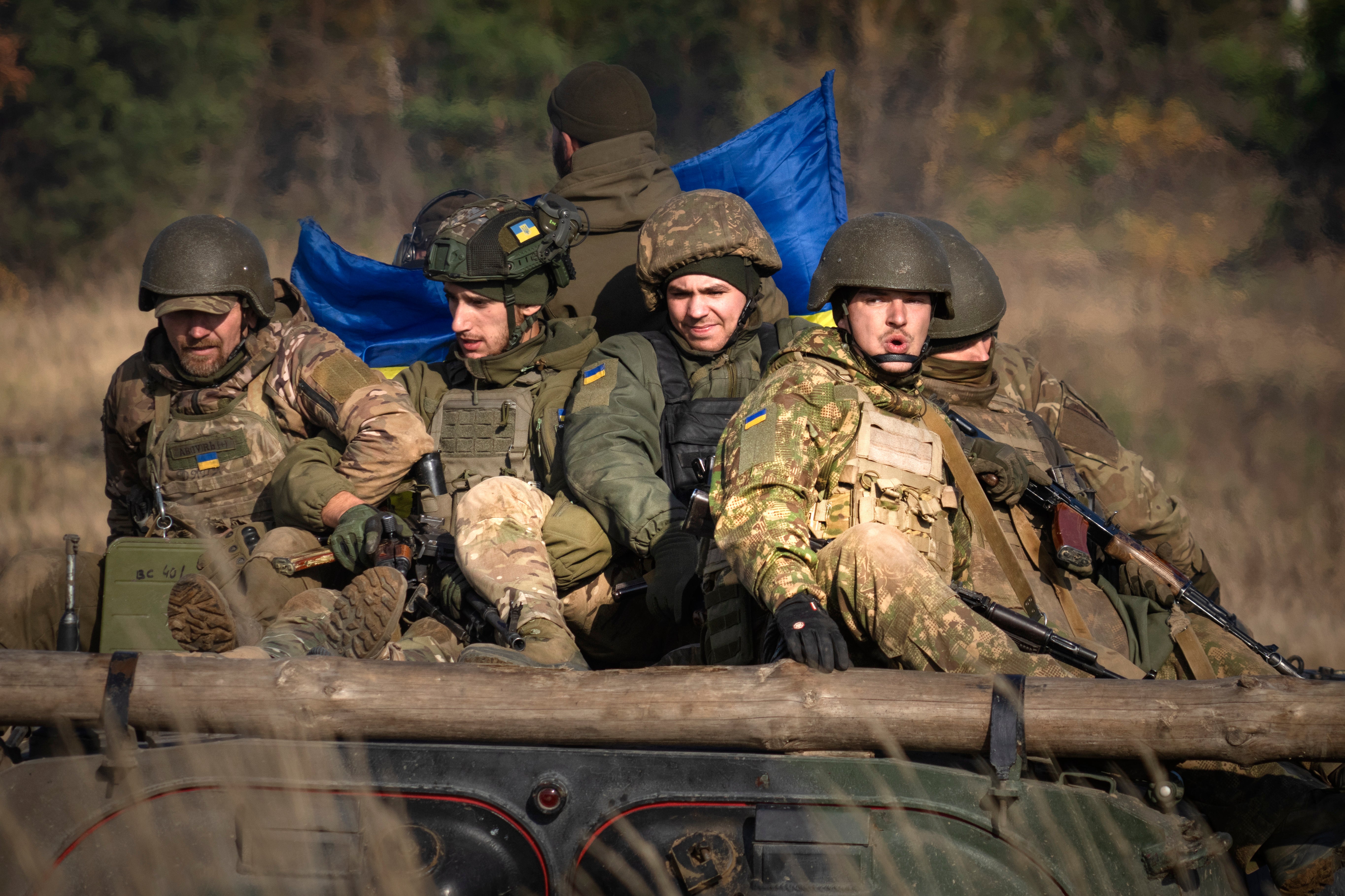 A soldier of Ukraine's National Guard 1st brigade Bureviy (Hurricane) rides an APC during combat training at a military training ground in the north of Ukraine