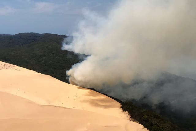 <p>File. In this handout image provided by Queensland Fire and Emergency Services, bushfires continue to burn on 30 November 2020 on Fraser Island, Australia. [Representational] </p>