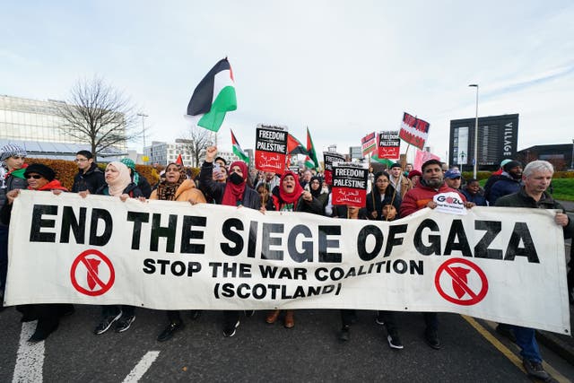 People take part in a Scottish Palestinian Solidarity Campaign protest in Glasgow (Jane Barlow/PA)