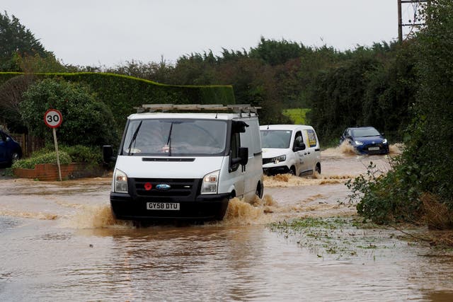 Flood warnings remain in place across parts of England and Wales (PA)