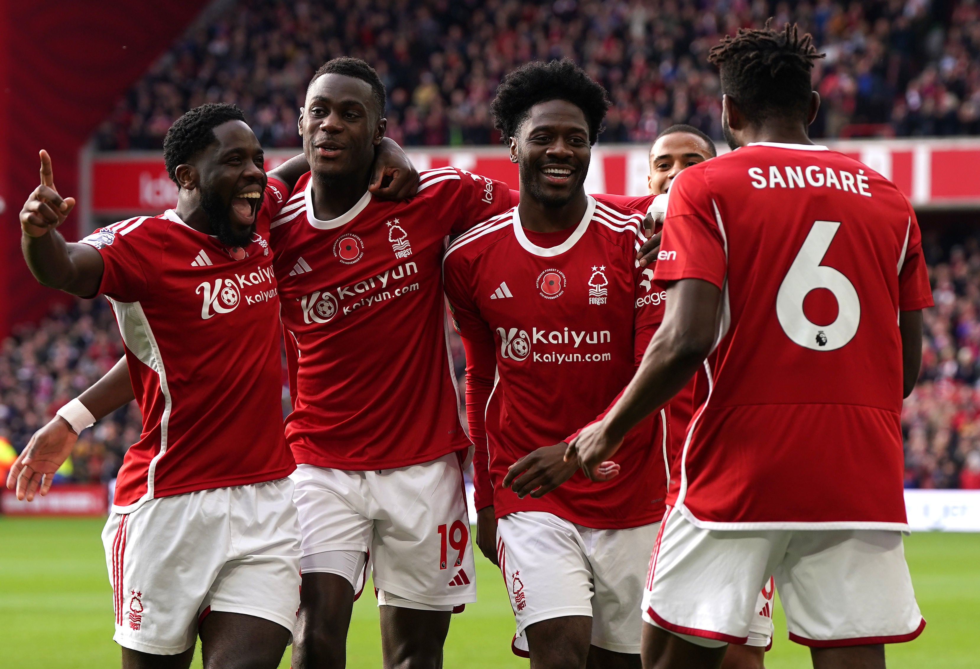 Nottingham Forest’s Ola Aina (centre) celebrates scoring the first goal of the game