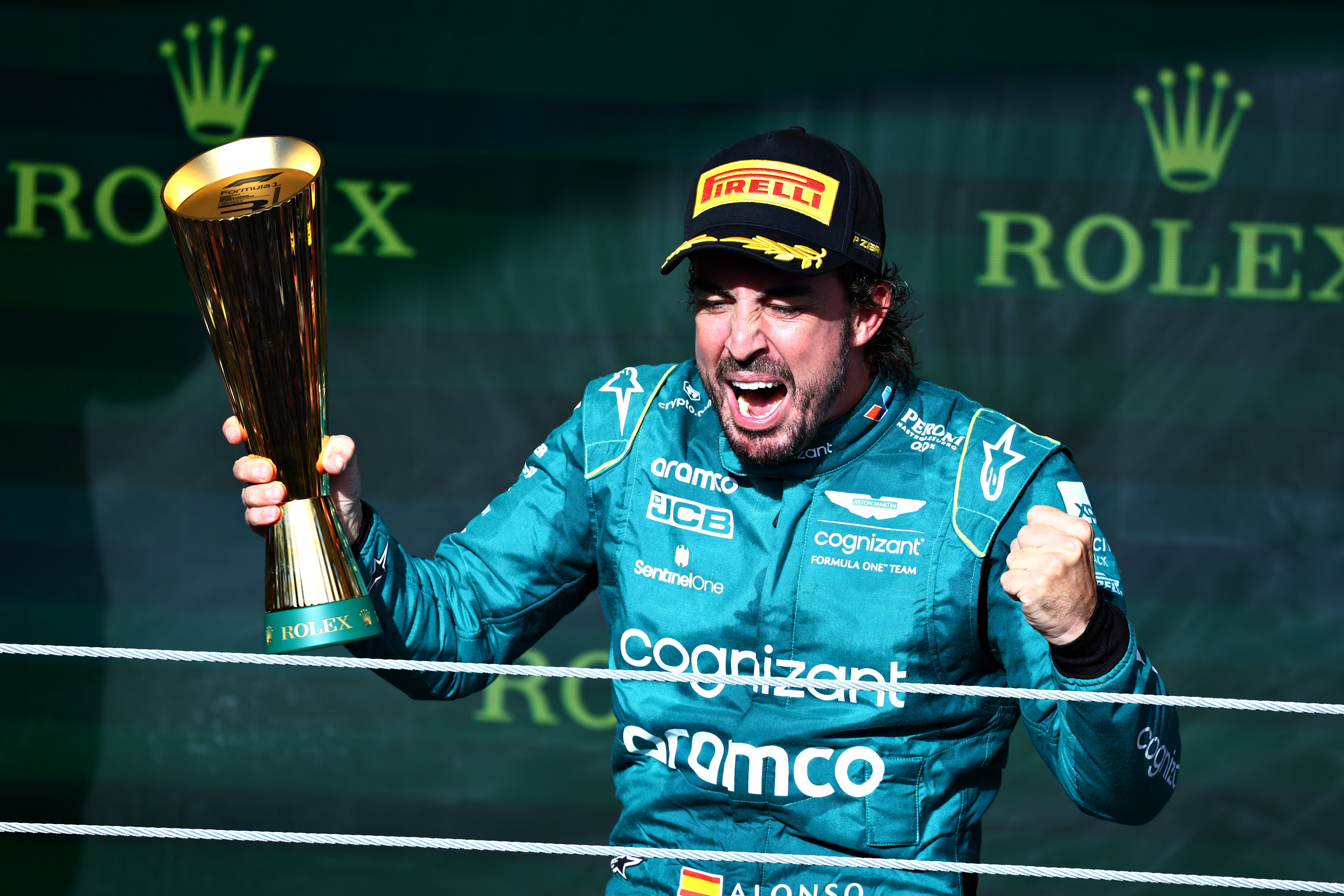 Fernando Alonso celebrates after a hard-fought podium