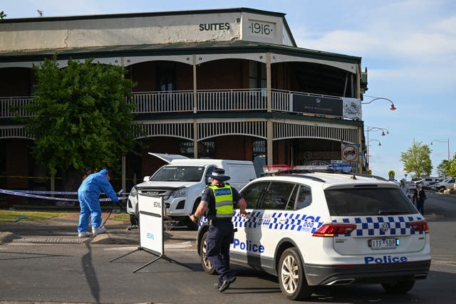 <p>Victorian police work the scene of a deadly car crash outside the Royal Hotel in Daylesford, Australia on Monday </p>