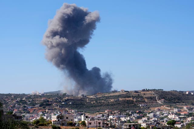 An Israeli air strike on the outskirts of Aita al-Shaab, a Lebanese border village (Hussein Malla/AP)