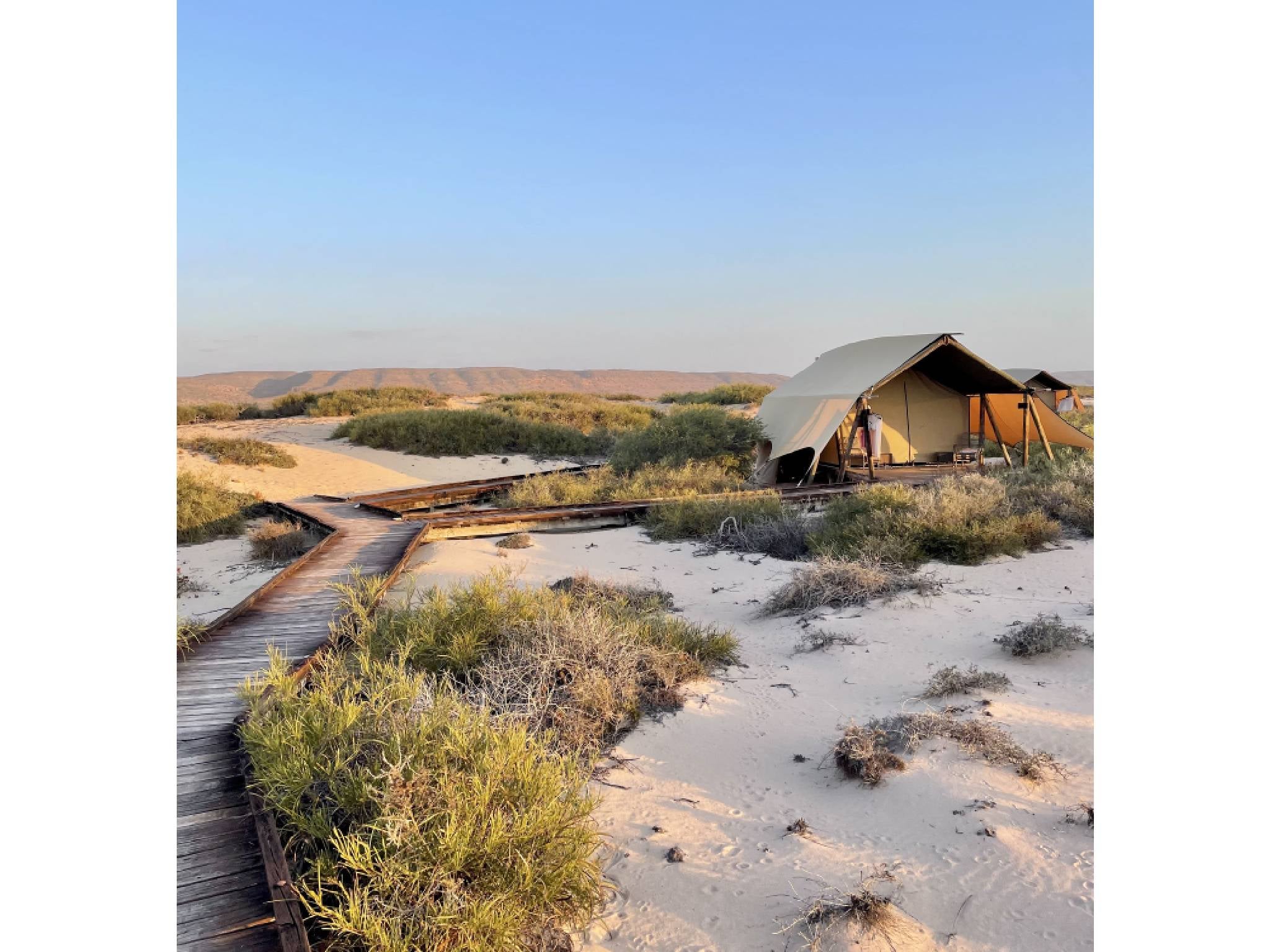 Eco-camp Sal Salis boasts tents hidden in the dunes complete with ensuite bathrooms