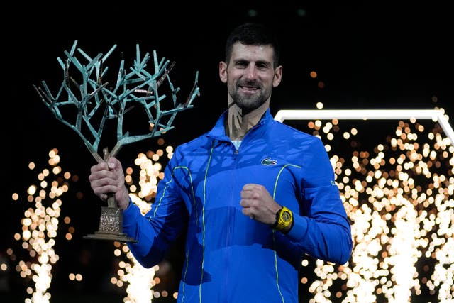 Novak Djokovic with the Paris Masters trophy (Michel Euler/AP)