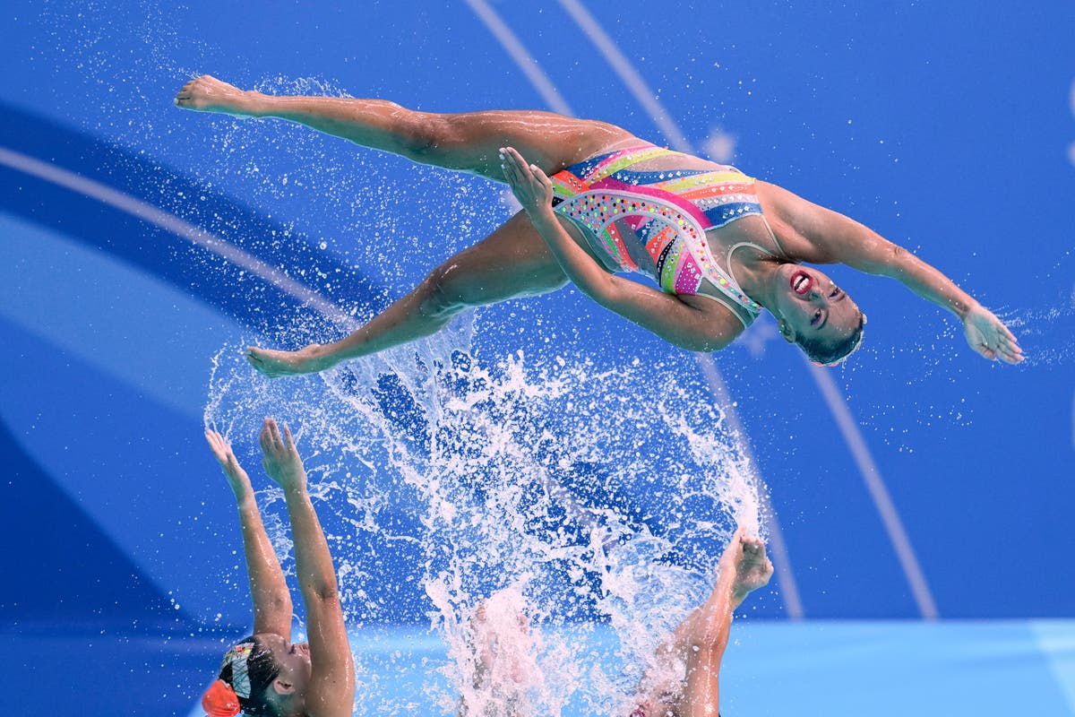AP PHOTOS Pan American Games feature diving runner, flying swimmer