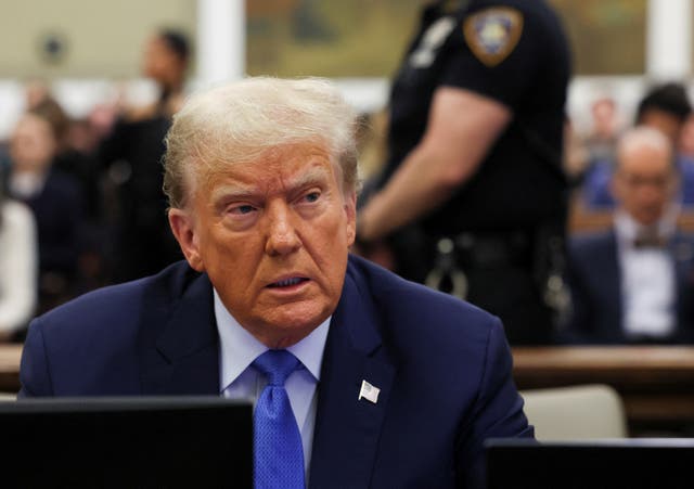<p>Donald Trump sits with his attorneys before testifying in New York on 6 November.</p>