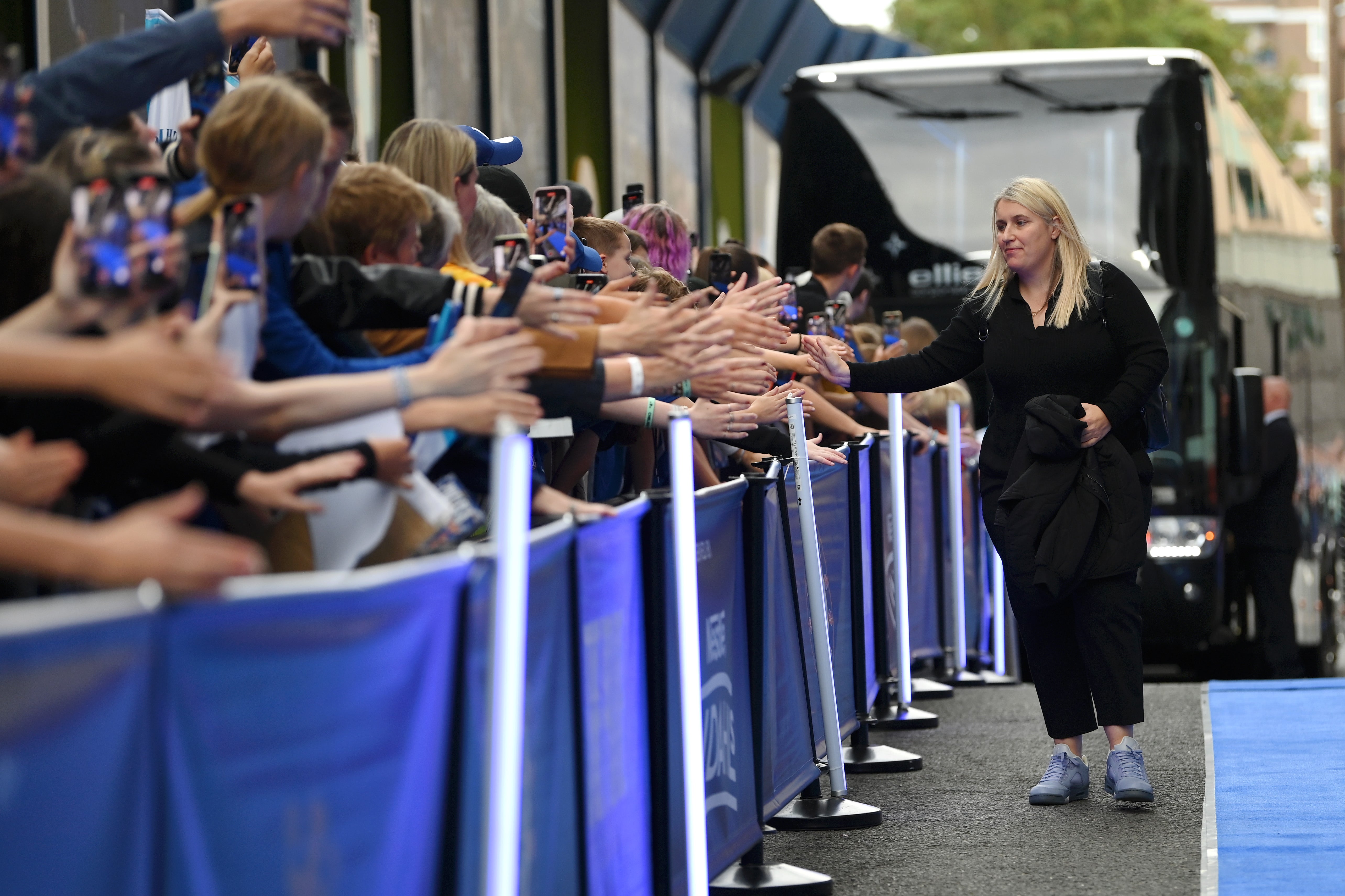 Hayes greets young fans before last month’s WSL game against Tottenham Hotspur