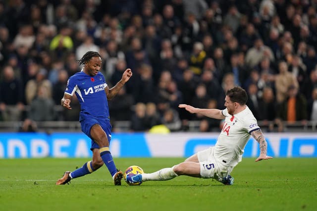 Tottenham’s Pierre-Emile Hojbjerg tackles Chelsea attacker Raheem Sterling (John Walton/PA)