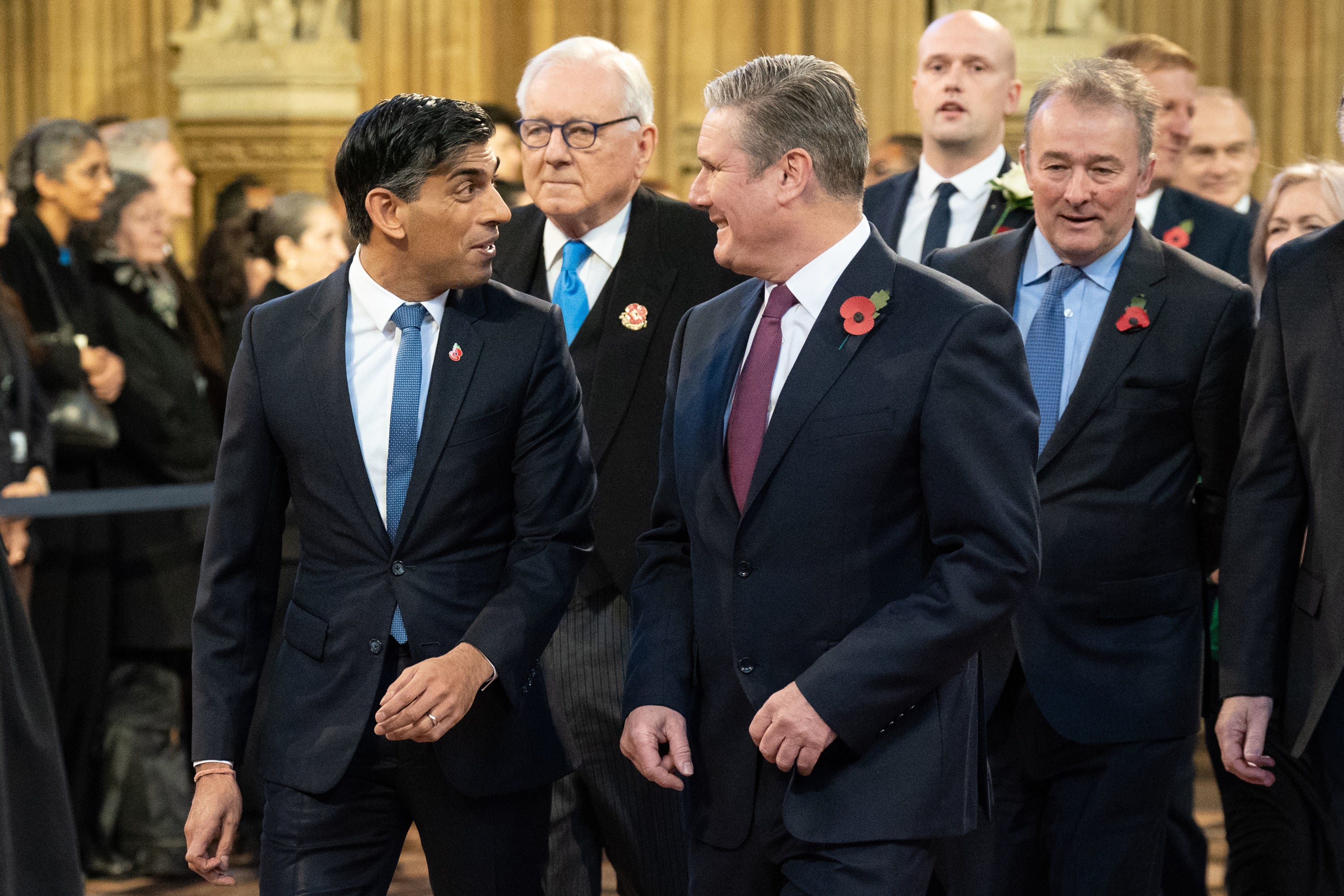 Prime Minister Rishi Sunak walks with Labour Party leader Sir Keir Starmer through the Central Lobby at Westminster