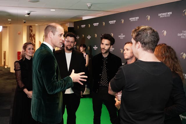 The Prince of Wales meeting the band OneRepublic during the 2023 Earthshot Prize awards ceremony (Jordan Pettitt/PA)
