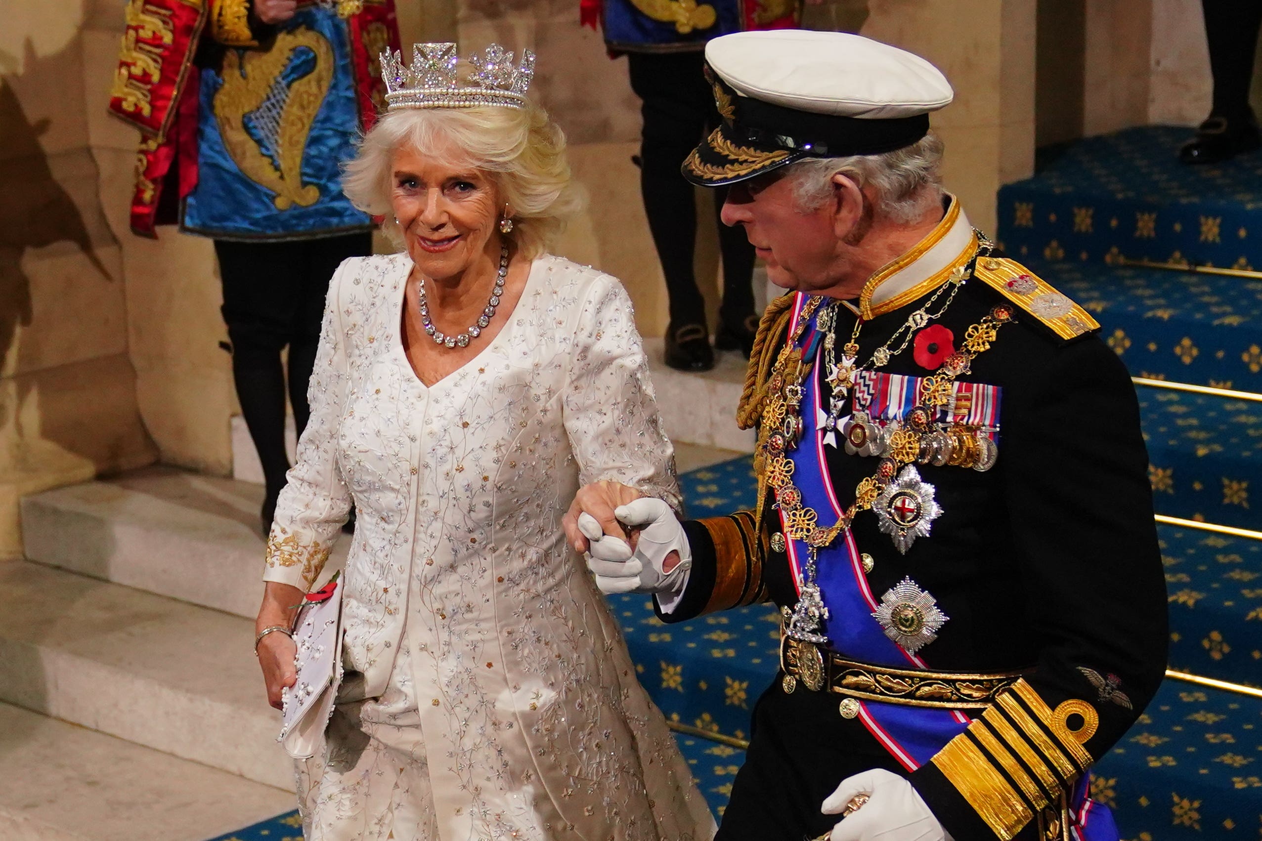The Queen and King hand in hand after the State Opening of Parliament (Victoria Jones/PA)