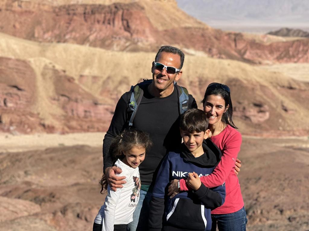 Batsheva Yahalomi (top right), 44, and her two daughters, aged 10 (bottom left) and 18 months old, managed to escape in a terrifying ordeal, while her husband Ohad (top left) and 12-year-old son Eitan (bottom right) were taken hostage by Hamas