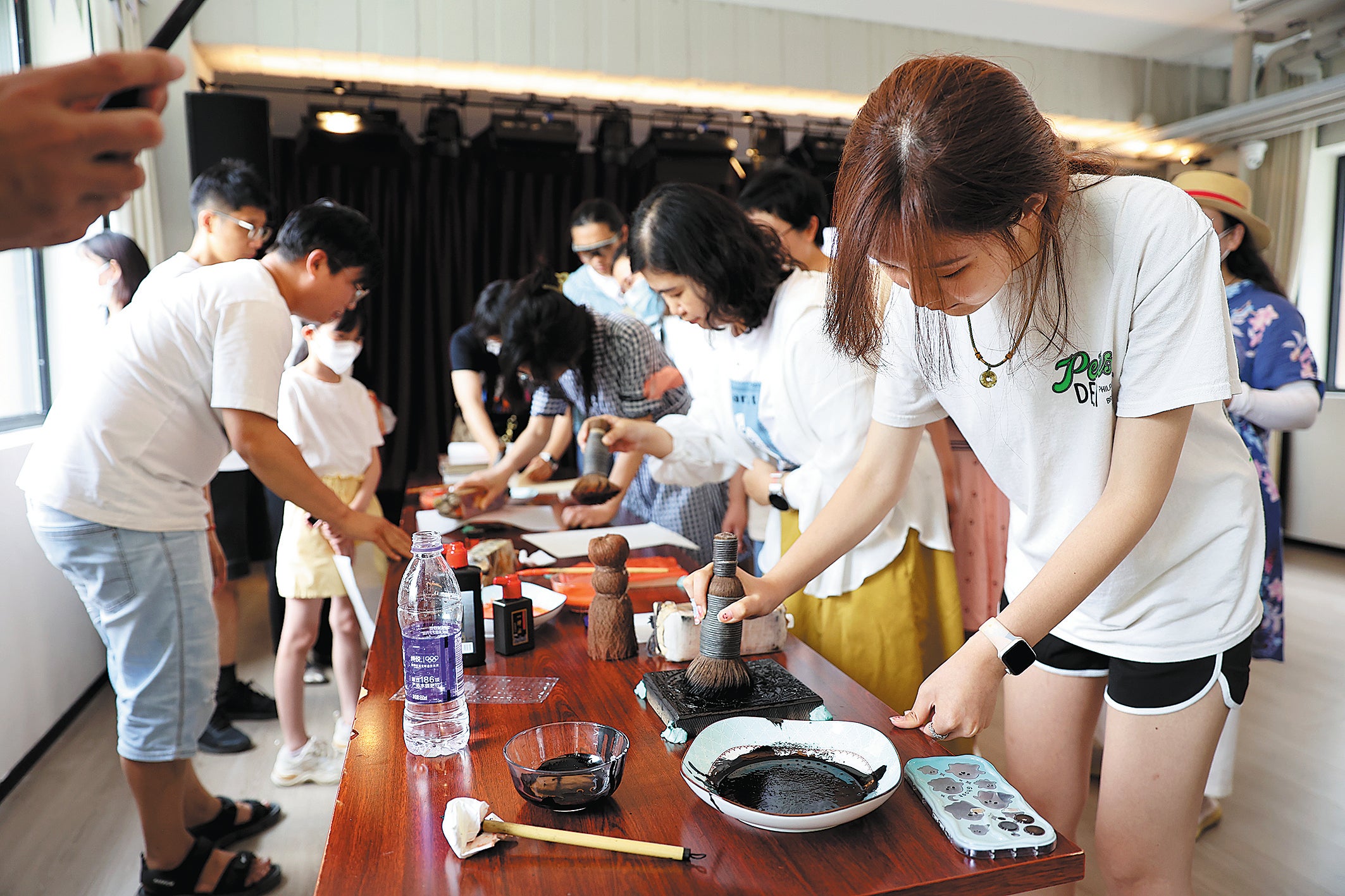 Visitors experience traditional woodblock printing at the park