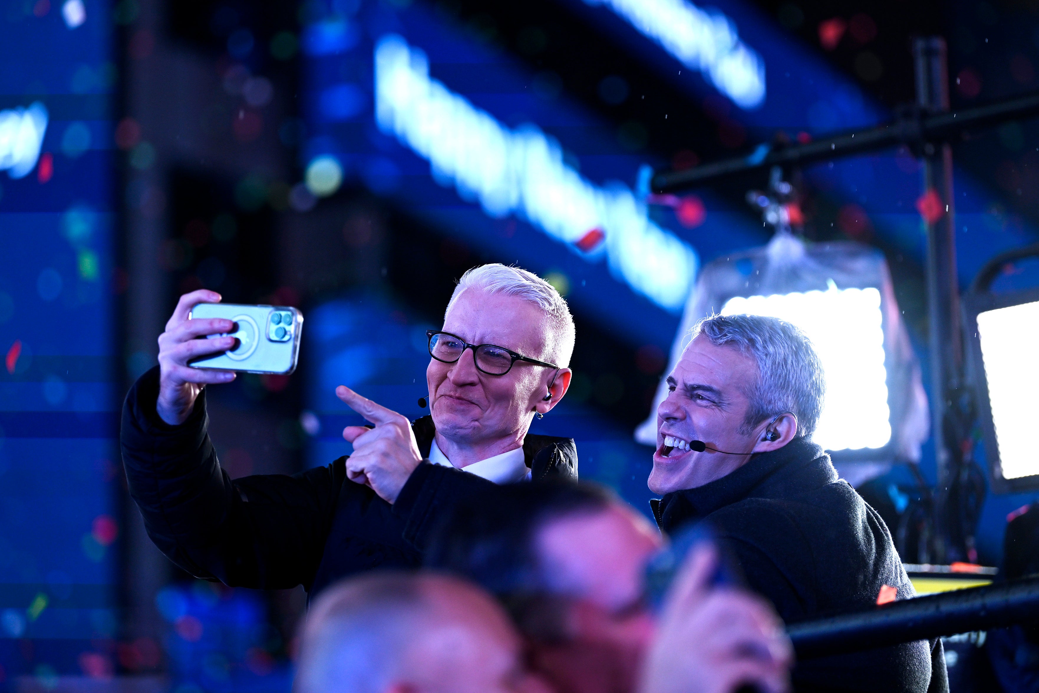 Anderson Cooper and Andy Cohen pose for a selfie during the Times Square New Year's Eve 2023 Celebration on December 31, 2022 in New York City.
