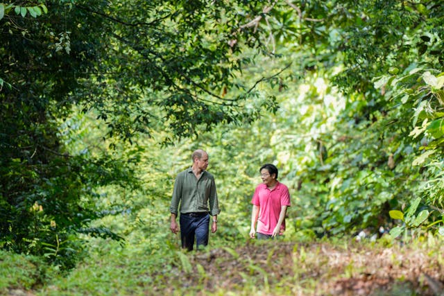Britain’s Prince William, left, and Singapore’s deputy prime minister Lawrence Wong visit the Central Catchment Nature Reserve of Singapore (Vincent Thian/AP)