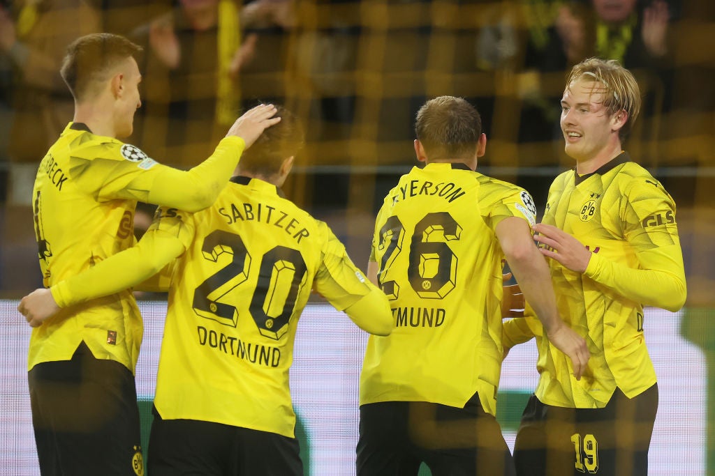 Julian Brandt (right) celebrates with teammates after scoring Dortmund's second goal