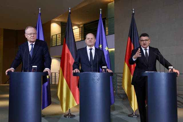 <p>Chancellor Olaf Scholz, centre, with leaders of German states</p>