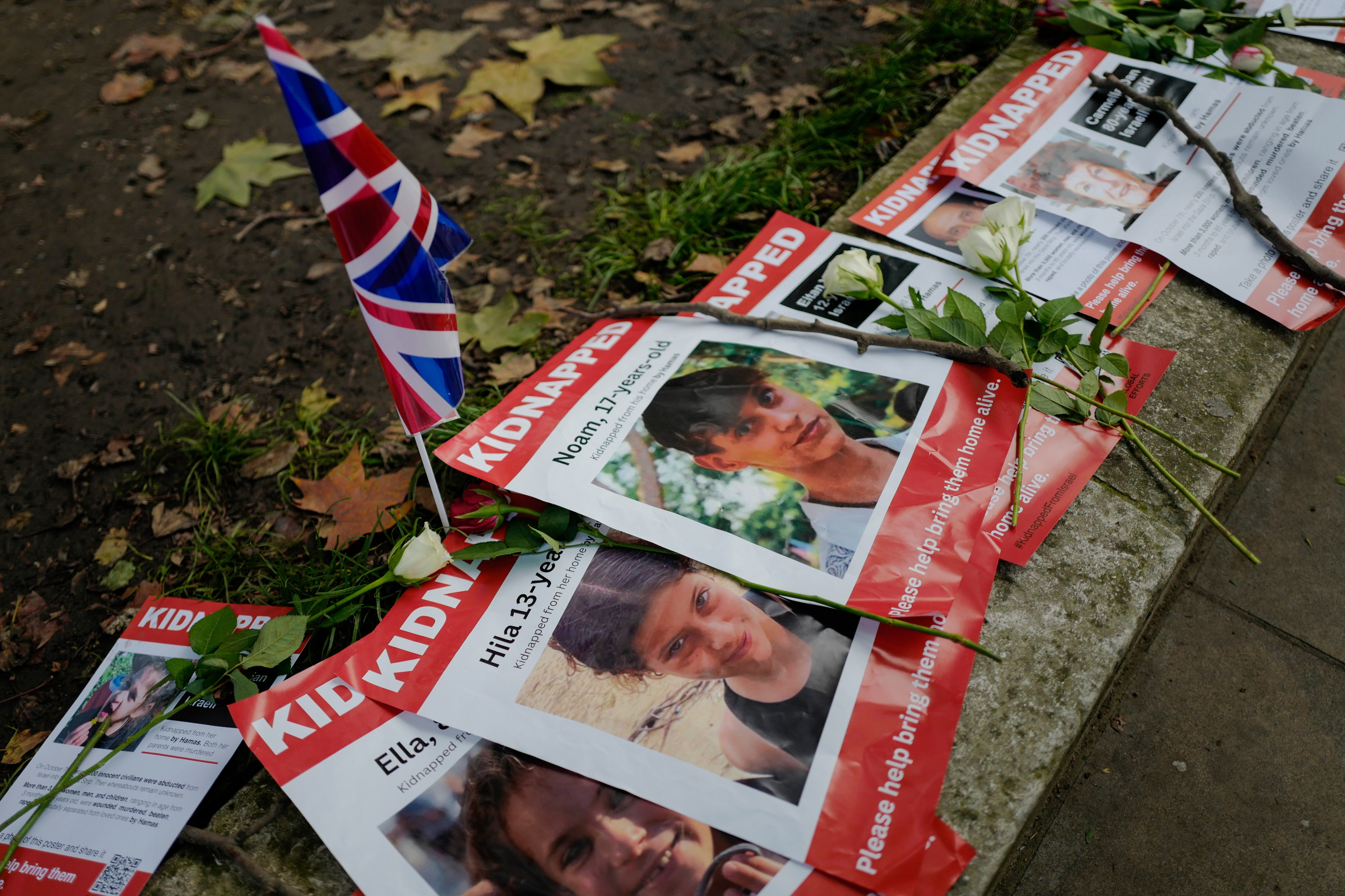 Posters outside Downing Street with the faces and names of some of those believed to have been taken hostage by Hamas