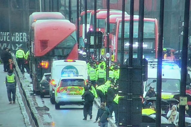 <p>The ambulance, which had its blue lights on, was blocked on Waterloo Bridge</p>