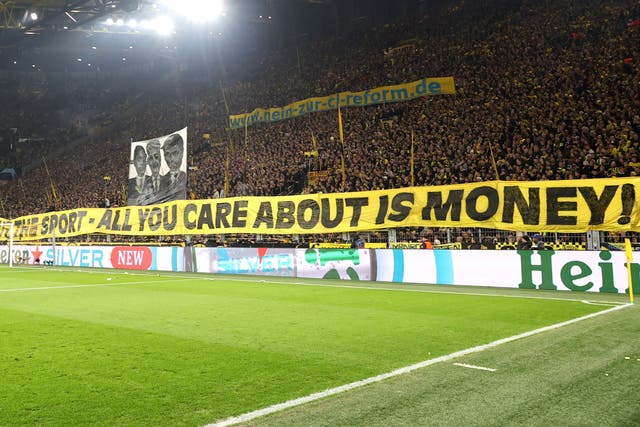 <p>Borussia Dortmund fans protested against Uefa </p>