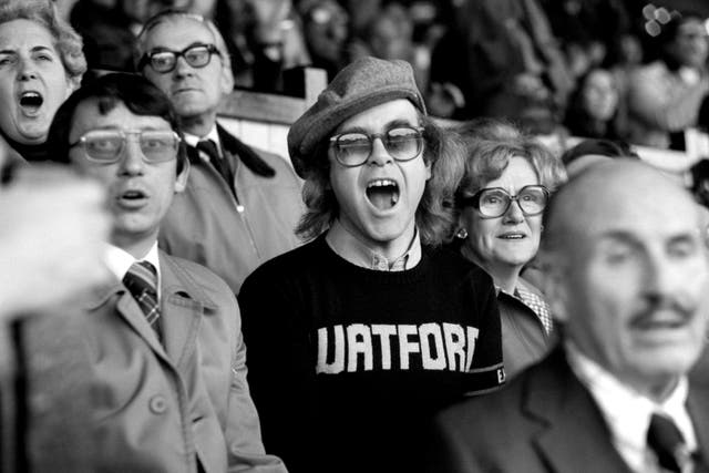 <p>Watford manager Graham Taylor, left, and Elton John take in a match together</p>