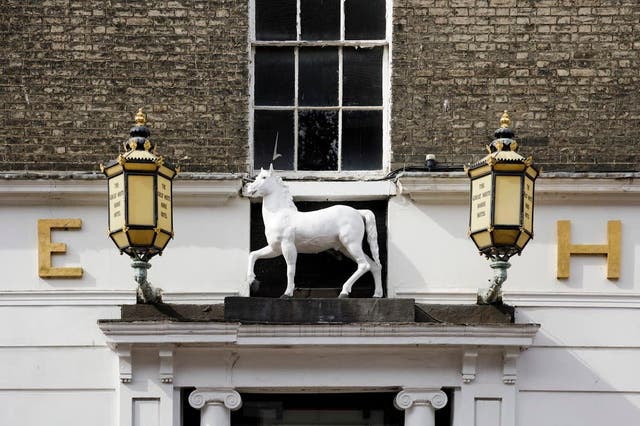 The Great White Horse Hotel which was made famous as the inn in Dickens’ first novel The Pickwick Papers (Historic England/PA)