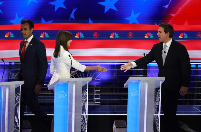 <p>Candidates shake hands after Wednesday’s Republican debate in Florida</p>